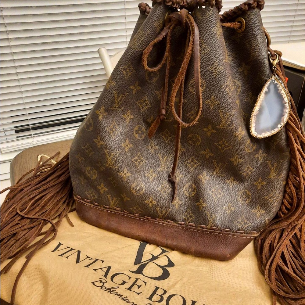 Vintage Boho Boutique Louis Vuitton bag with a keychain